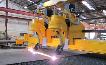 MicroStep machine with two rotators for cutting two identical parts at once.